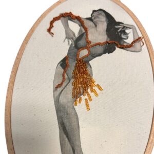 BETTIE PAGE — HAND-EMBROIDERED PHOTOGRAPH WITH BEADED FRINGE